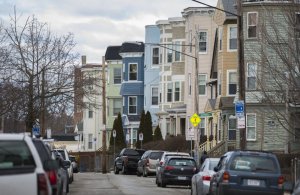 Triple-deckers along Edgewood St in Boston